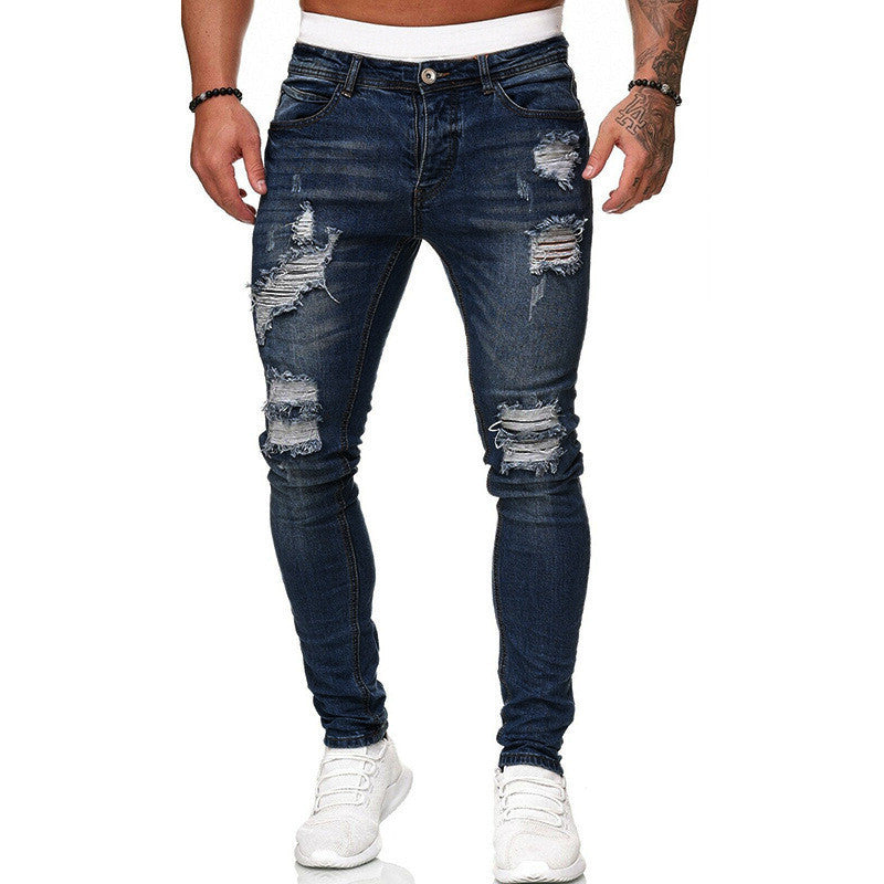 Dark blue slim fit ripped jeans by Yuvoro