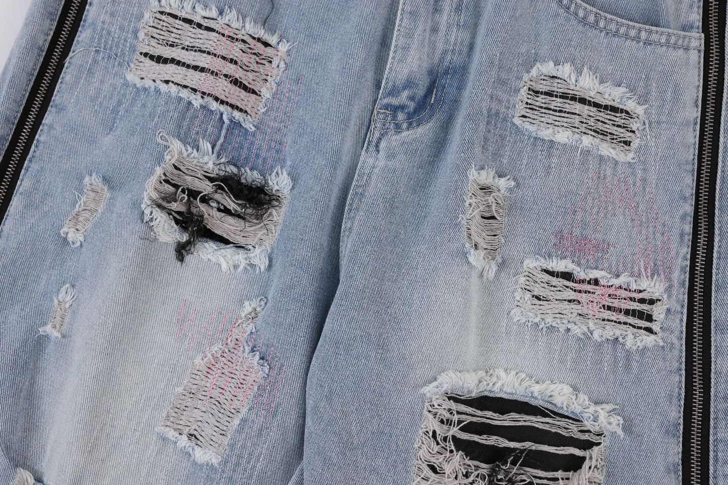 Teen street fashion ripped light blue jeans