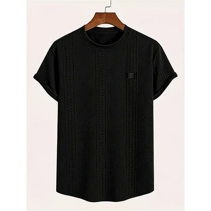 Close-up of geometric embroidery detail on polyester tee
