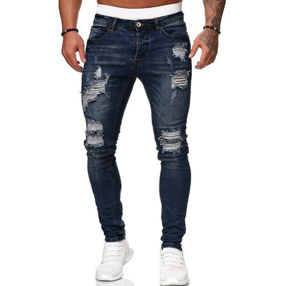 Dark blue slim fit ripped jeans by Yuvoro