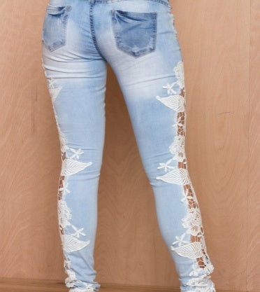 Dark wash lace-accented women’s denim