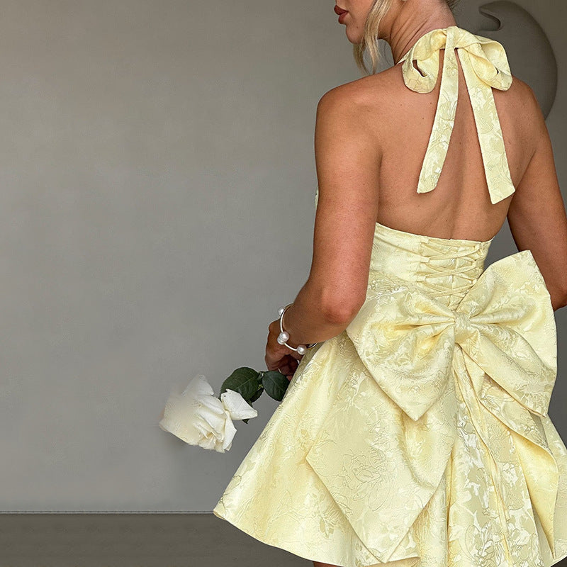 Side view of fitted halter cocktail dress